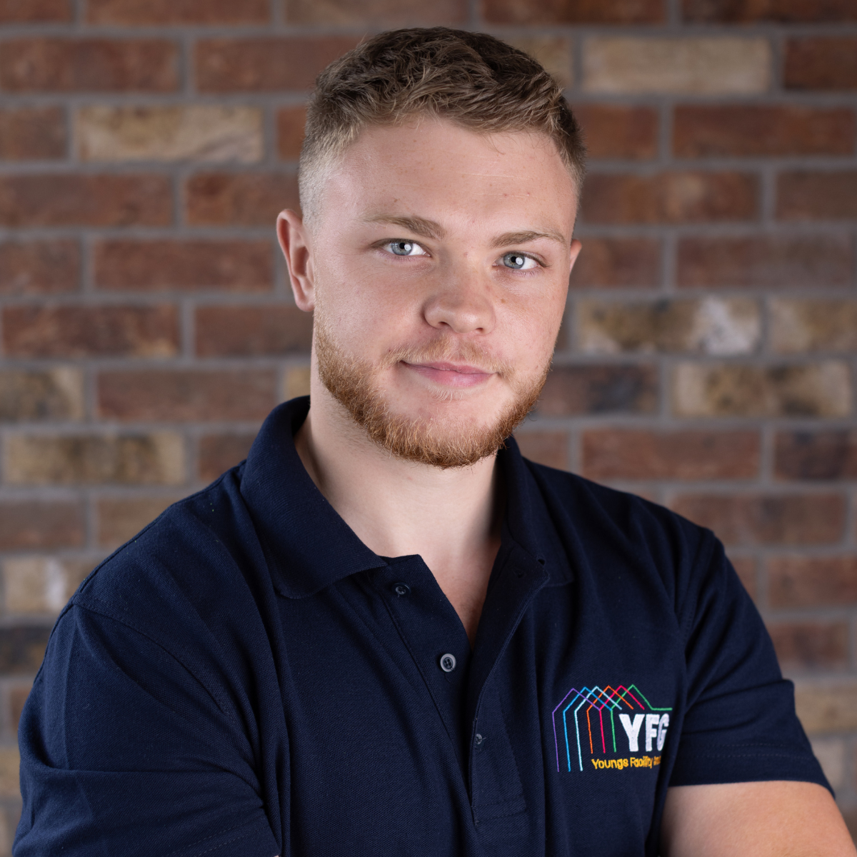 Jack A worker from Youngs Facility Group completing hard facilities management.